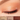 Close-up of a closed eye showing three numbered eyeshadow looks labeled 1, 2, and 3, with a color swatch strip at the bottom reading TAJ MAHAL I, TAJ MAHAL II, and TAJ MAHAL IV.