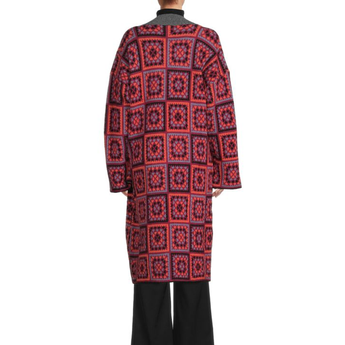 Red and black patterned coat on a white background